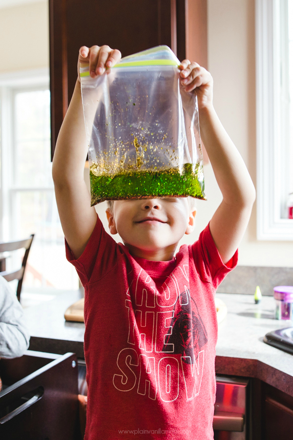 Boy holding Glittler Blog Sensory Bag