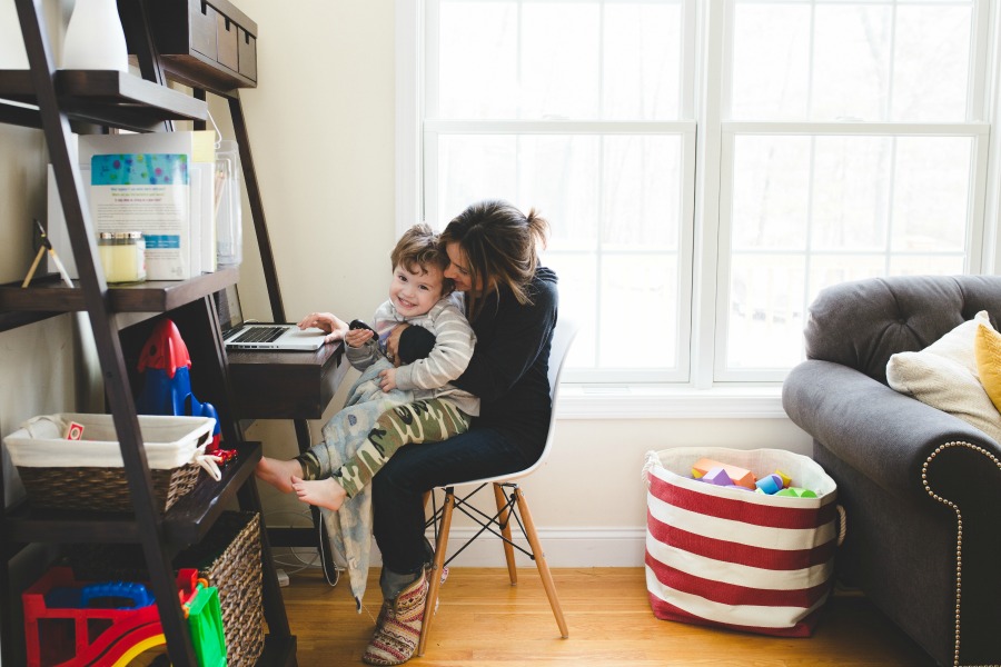 self portrait of mom working with kids